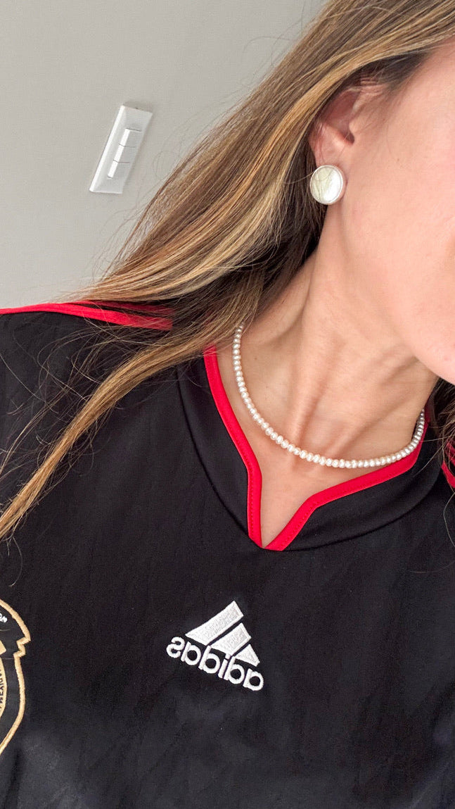 Aretes Botón de Madre Perla en Plata .925