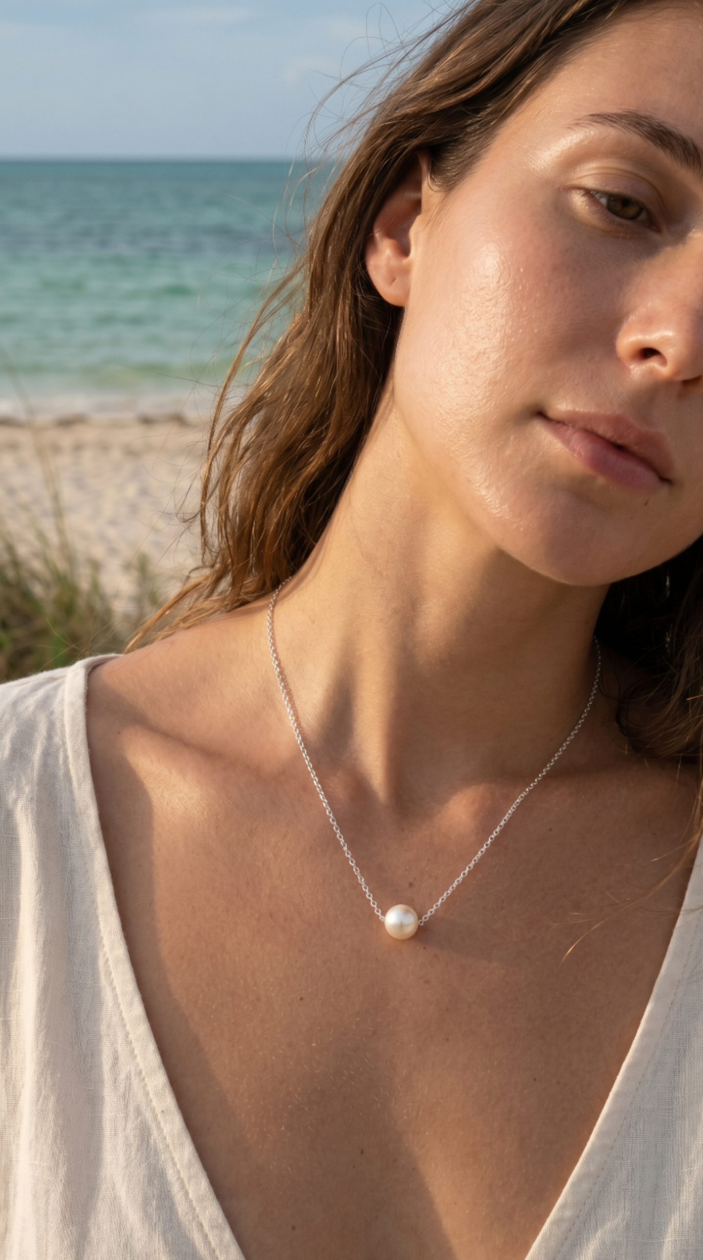 Collar de plata con una perla
